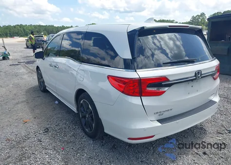 2023 Honda Odyssey Elite z USA, uszkodzony, nr VIN 5FNRL6H97PB047753